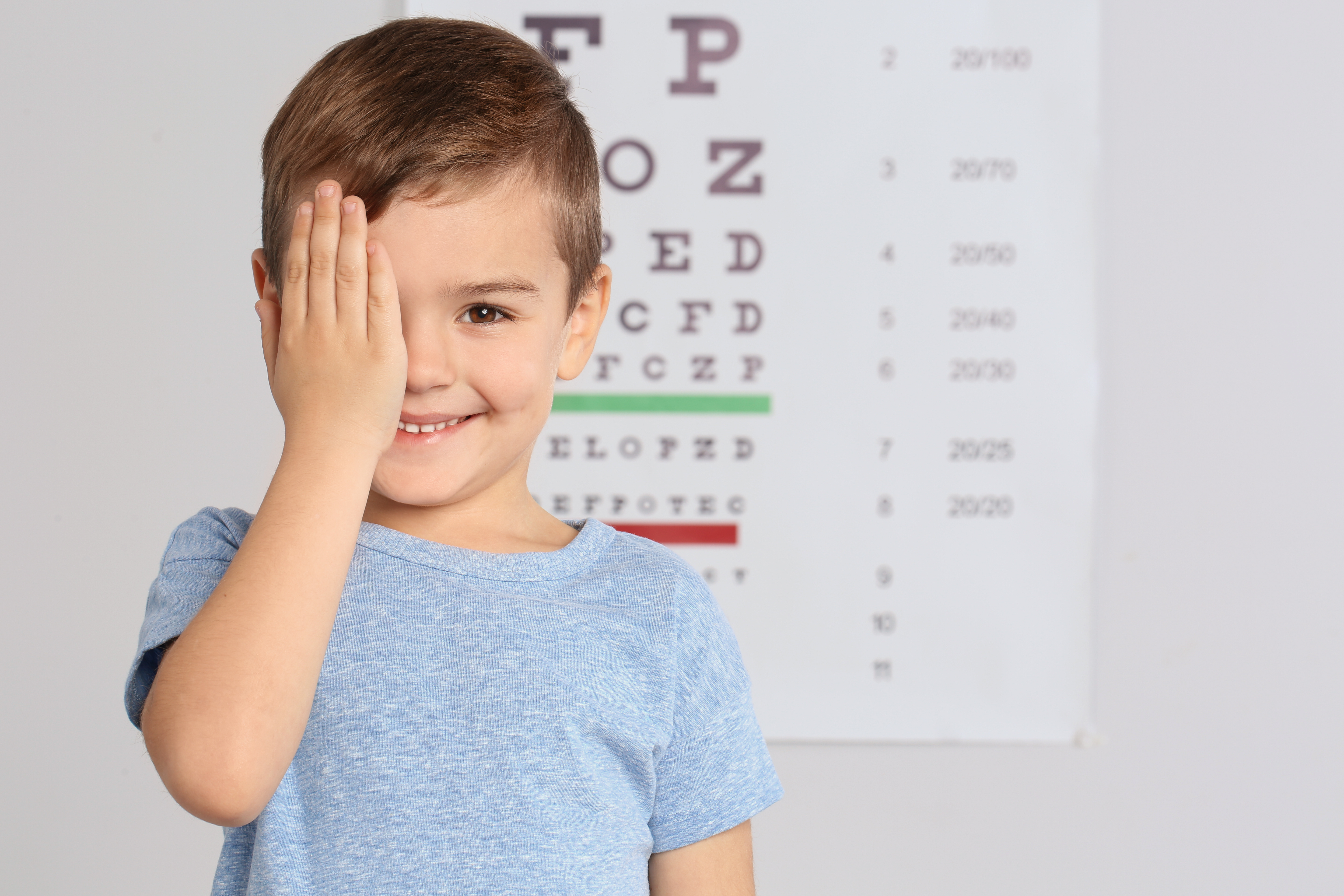 Child receiving an eye exam at a clinic